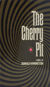 book cover "the cherry pit" with swirling lines and a red circle