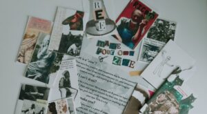 various printed material spread out on table