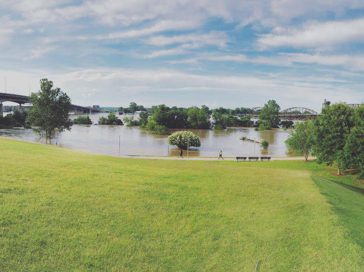 View of the Arkansas River during flood, taken from downtown Little Rock, Arkansas, photographed by Nader Afsordeh.