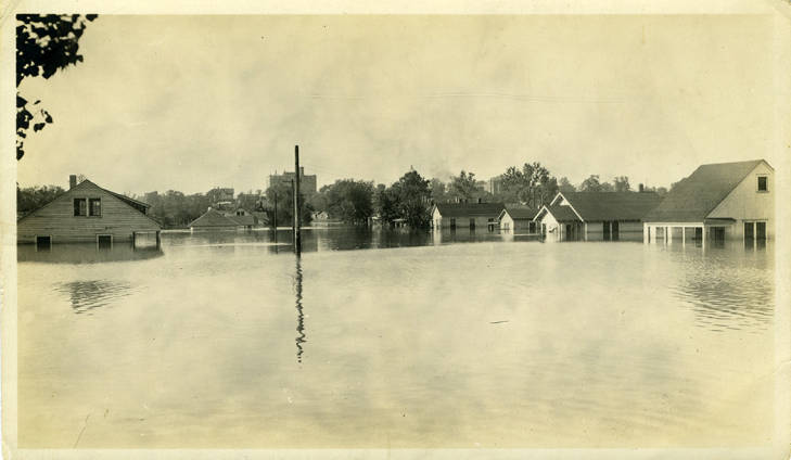 Flooded homes, North Little Rock, Arkansas, 1927. Digitized photo from the Pulaski County Disasters Photograph Collection. (bc_pho_2a11_0130)