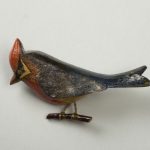 Wooden lacquer pin of a woodpecker
