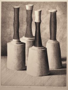 Four cylindrical mallets with handles