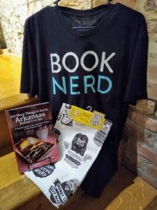 "Book Nerd" T-shirt book and dish towel on display