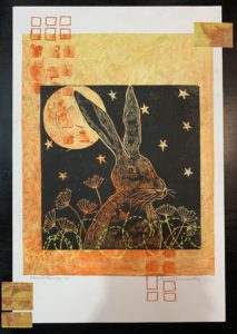 Rabbit under night sky with flowers in frame