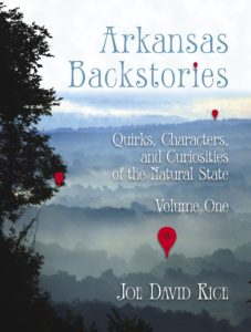 Tree covered valley on "Arkansas Backstories" book cover
