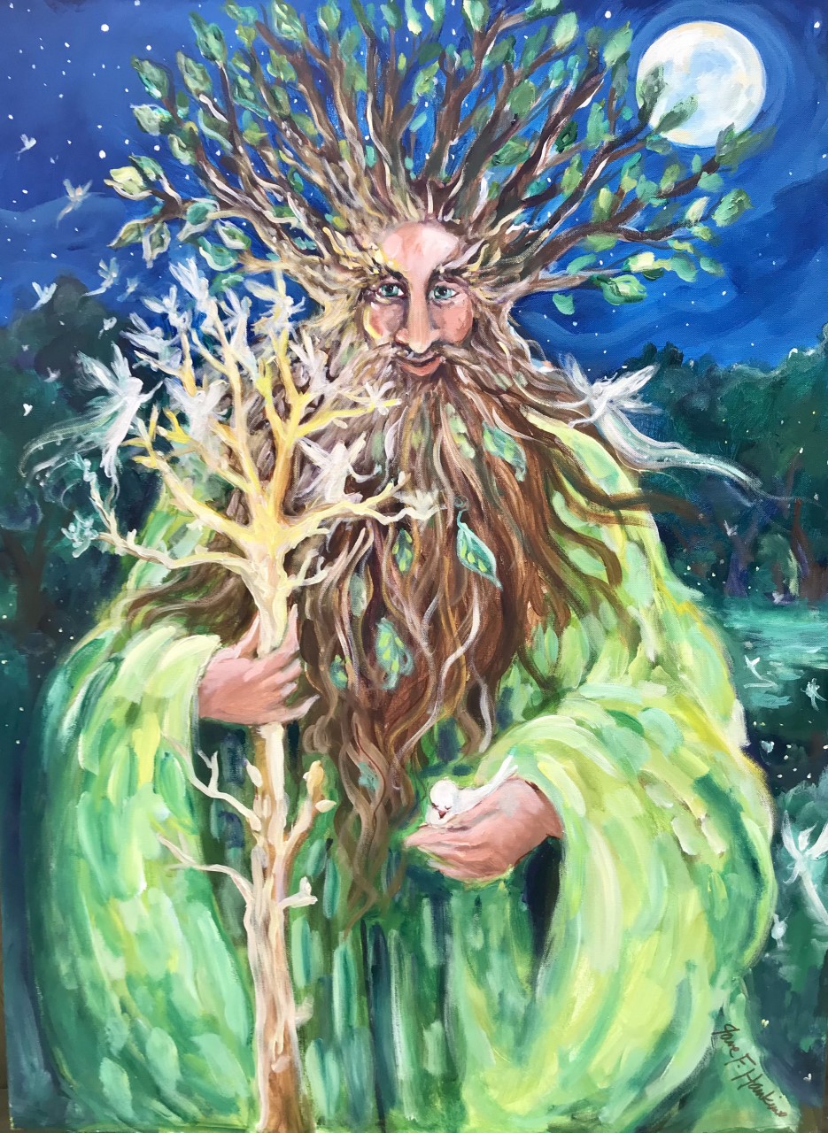 White man with long brown beard wearing green robe holding tree branch staff and tree branch in his hair