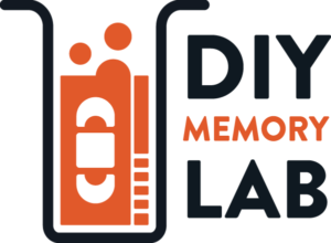 VHS tape in a beaker with bubbles coming out of the tape and "DIY Memory Lab"