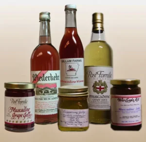 Jars of muscadine jellies and bottles of grape juice and wine