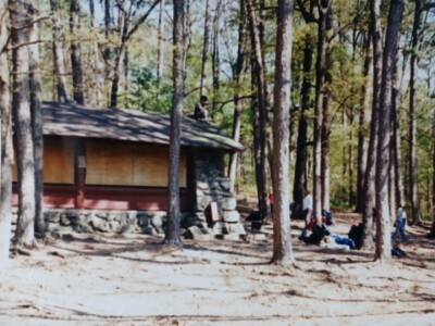 view of camp cabin among trees